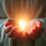 A calming image of hands gently cupped, with soft light, evoking a sense of inner peace and mindfulness.